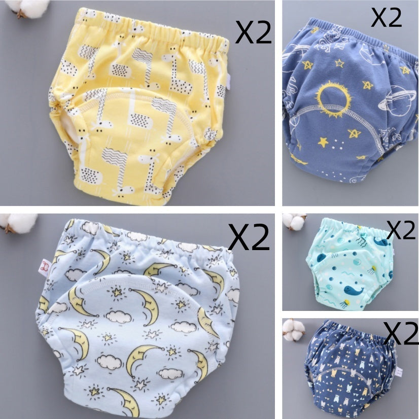 Set of baby diapers with different patterns on a gray background
