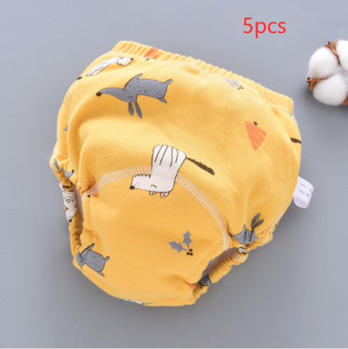 Yellow baby diaper with animal pattern on a gray background