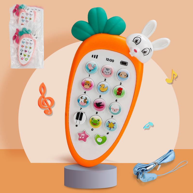 Carrot-shaped toy phone with colorful buttons on a peach background