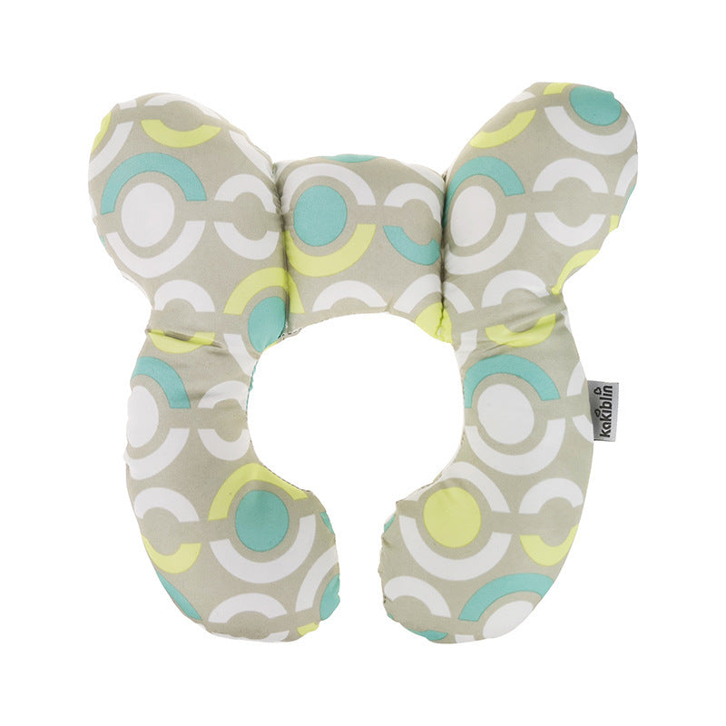 Travel pillow with geometric pattern on a white background