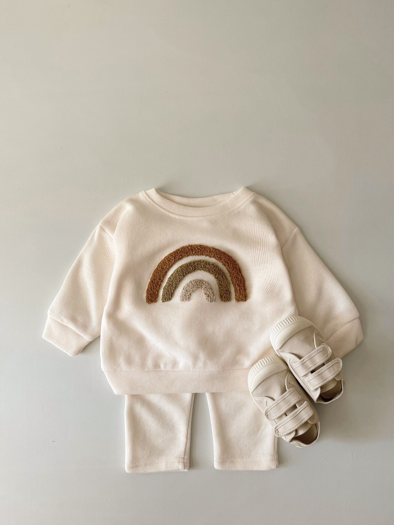 Camel colored baby outfit with educational letter embroidery for early learning