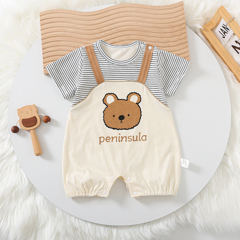 Baby romper with bear design and striped shirt on a white surface