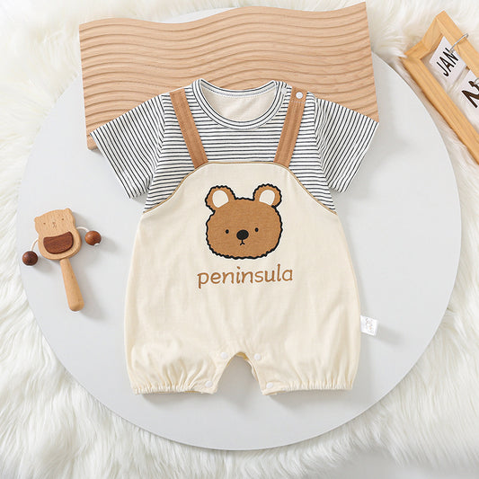 Baby romper with bear design and striped shirt on a white surface