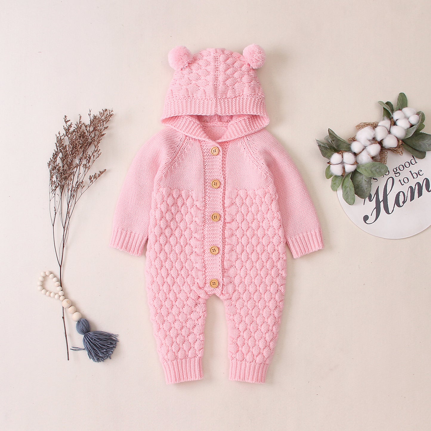Baby hooded knit romper with long sleeves ideal for cool weather and layering