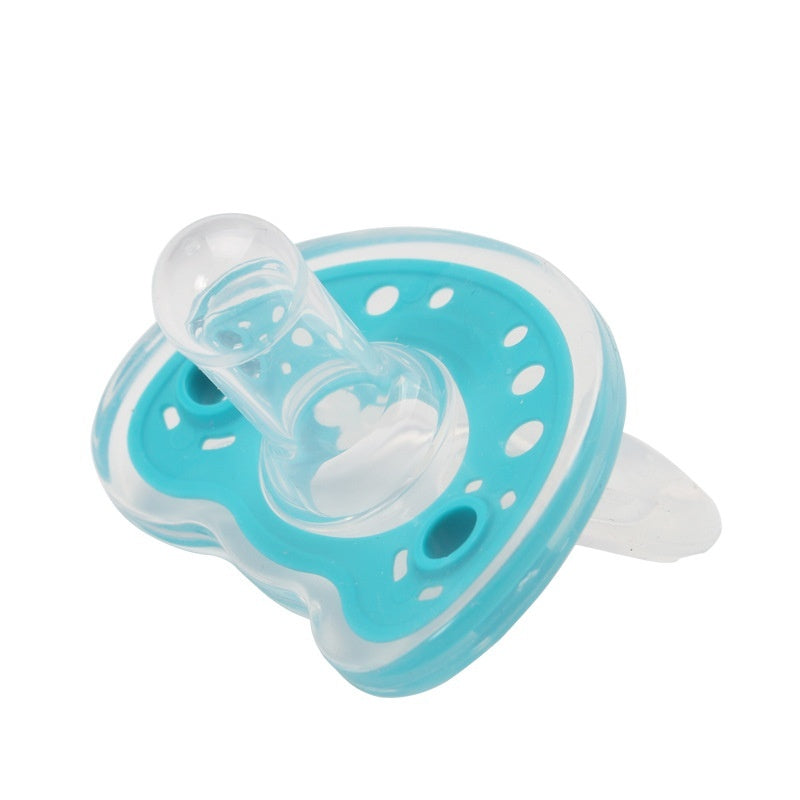 Blue and clear pacifier on a white background