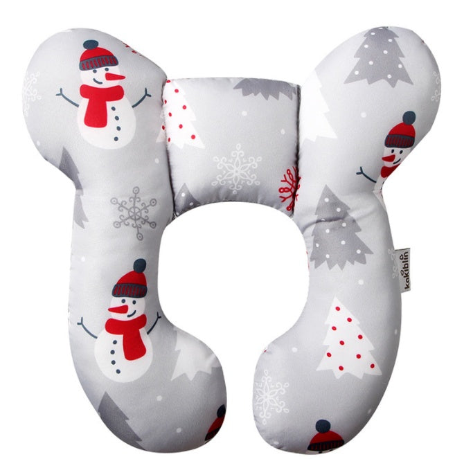 U-shaped travel pillow with Christmas-themed design featuring snowmen and trees on a white background.