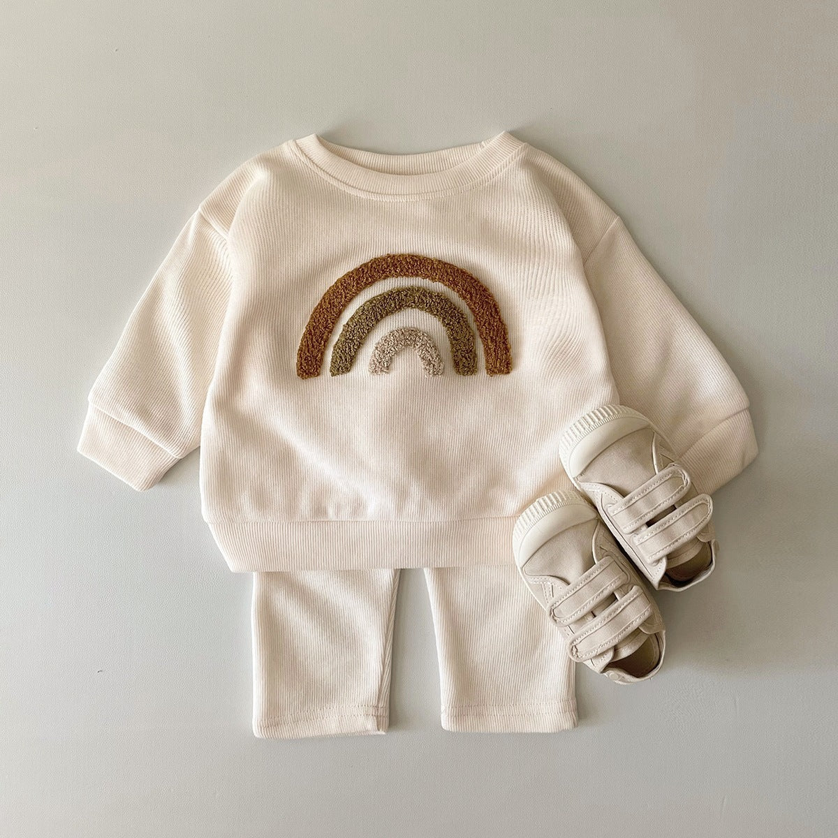 Soft cotton baby outfit with letter details combining style and learning