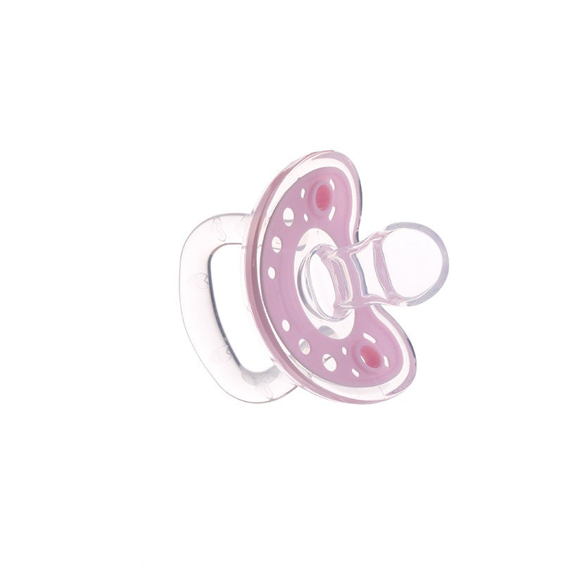 Pink baby pacifier on a white background