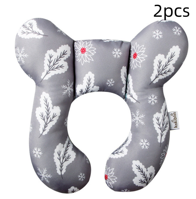Two gray travel neck pillows with floral pattern on a white background