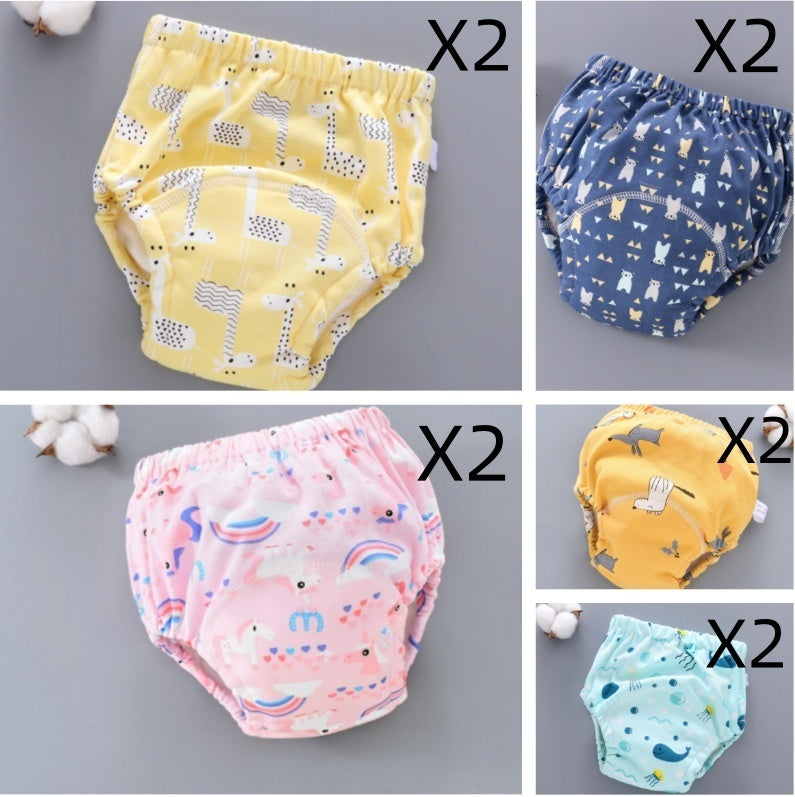 Set of baby diapers with various patterns on a gray background