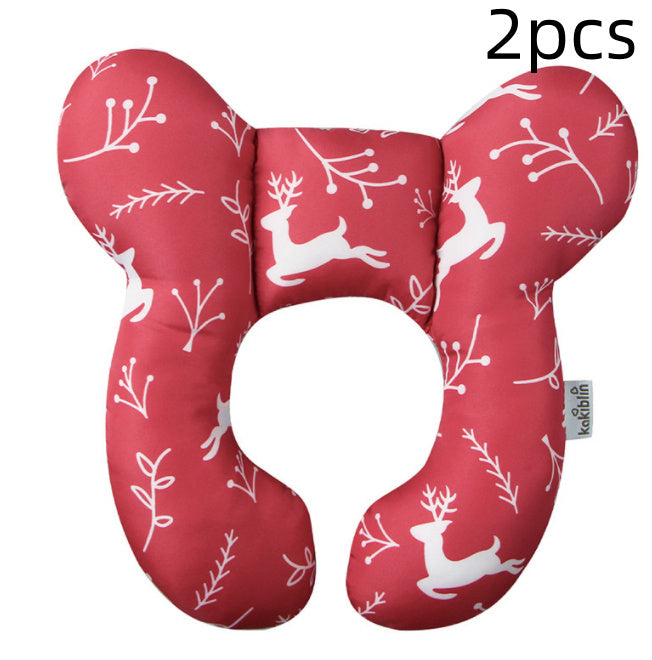 Red travel neck pillow with white reindeer pattern, labeled '2 pcs' and 'Kokobell'.