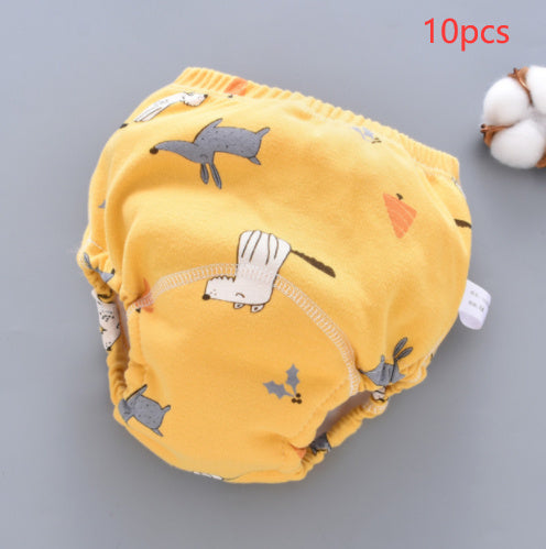 Yellow baby diaper with bird pattern on a gray background